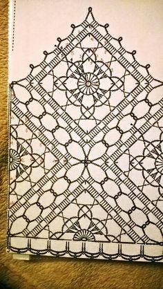 a piece of paper with an intricate design on it