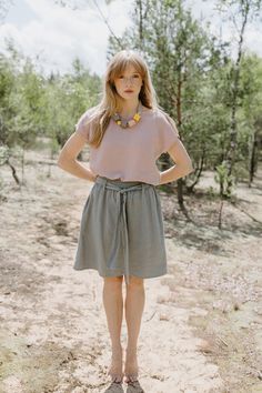 "PRODUCED in 3-5 days FAST & FREE shipping with DHL Express Courier -10% for all items with code \"FAVOURITE\" Feel the spells of nature in this belted mini skirt! Made from breathable linen in a sage green color it is easy to style and comfortable to wear. Details: - 100% Linen - Elastic waistband - Adjustable belt - Two side pockets - Flowy silhouette - Above knee length - Model's height is 172 cm / 5'7'' wears size M - Code: E4002-L532-303 The skirt is available in other colors. You can find them in the gallery. If you want to order the skirt in another color, please specify it in the personalization field. Sizing: This garment is true to size, and we recommend choosing the size you usually wear. If you want the garment to be loose-fitting, choose a larger size than you usually wear. Be Spring Green Skirt With Tie Waist, Spring Linen Mini Skirt In Relaxed Fit, Relaxed Linen Mini Skirt For Spring, Linen Mini Skirt With Relaxed Fit For Spring, Linen Mini Skirt With Lined Detail, Linen Mini Skirt With Lining, Summer Linen Mini Skirt Lined, Summer Linen Mini Skirt With Lining, Casual Linen Mini Skirt For Spring