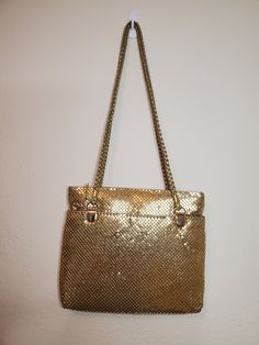 Beautiful gold metal sequin vintage purse. Looks to have never been used. Vintage Gold Shoulder Bag For Party, Vintage Gold Shoulder Bag With Gold-tone Hardware, Gold Sequined Bags For Party, Gold Sequined Party Bag, Gold Sequin Party Bag, Gold Party Bags With Sequins, Retro Gold Rectangular Shoulder Bag, Gold Sequin Clutch Bag, Vintage Gold Shoulder Bag For Formal Occasions