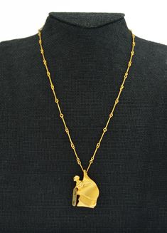 Monday-Saturday 10am-6pm EST Home All Listing Auction Buy It Now Shipping Feedback Policies About Us FAQ Contact Us 1980 Bjorn Weckstrom Lapponia Brutalist Modernist 14k Gold Granite Necklace 18.5 Details For your consideration is a vintage 1980 signed Bjorn Weckstrom For Lapponia Brutalist Modernist Matte 14k Yellow Gold Granite Necklace in excellent pre-owned condition. This necklace designed by the famous brutalist/modernist Finnish jewelry designer Bjorn Weckstrom for his company Lapponia features a sculpted design with a generic head/face and inlaid granite set into fine 14k yellow gold with a matte finish and bar link chain. The necklace shows minimal light wear with an original matte finish and no major cosmetic issues. This necklace was examined by a GIA graduate gemologist to veri Modernist Hallmarked Yellow Gold Jewelry, Hallmarked Modernist Yellow Gold Jewelry, Modernist Gold Jewelry For Evening, Formal Yellow Gold Wire Wrapped Jewelry, Elegant Hand Forged Yellow Gold Necklaces, Elegant Hand Forged Yellow Gold Necklace, Sterling Silver Yellow Gold Wire Wrapped Necklaces, Yellow Gold Wire Wrapped Pendant Jewelry, Wire Wrapped Yellow Gold Pendant Jewelry