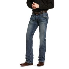 Ruggedly handsome for wherever the day (or night) takes you. These jeans are low-waisted and cut slimmer through the seat and thigh with a fashion boot-cut leg opening. Slim through seat and thigh Low rise Stackable straight leg 13.5 oz ring-spun stretch denim Medium wash with fashion back pocket No-rub comfort inseams Anchored belt loops Heavy-duty zippers and hardware Extra deep front pockets 99% cotton, 1% spandex Machine wash cold | Men's M5 Slim Stretch Adkins Stackable Straight Leg Jeans i Gold Quince, Surprise Dance, Straight Leg Jeans Men, Mens Straight Jeans, Mens Clothes, Jeans Men, Boy Shoes, Men's Clothes, Low Waisted