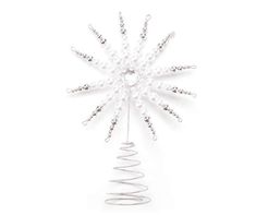 a white christmas ornament with pearls and beads in the shape of a snowflake