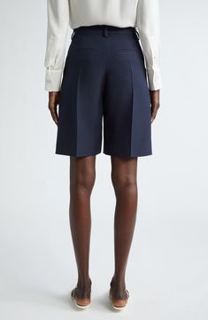 Keep your warm-weather look polished in these Bermuda shorts impeccably tailored from the label's signature crepe couture fabric woven from wool and silk. 11" inseam; 22" leg opening; 10" front rise; 12" back rise (size 40 IT) 65% virgin wool, 35% silk Dry clean Made in Italy Designer Clothing Tailored Bermuda Shorts, Classic Formal Shorts For Spring, Formal Classic Shorts For Spring, Chic Formal Shorts With Short Inseam, Elegant Formal Shorts With Short Inseam, Fitted Formal Shorts For Spring, Classic Tailored Shorts For Business Casual, Classic Formal Bottoms With Short Leg, Tailored Formal Shorts