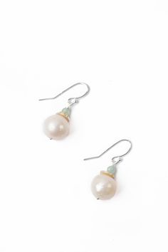 The Serenity Collection is beloved classic line from Anne Vaughan Designs. These mindfully crafted earrings are ideal for pairing with other items from the collection. Sterling Silver (nickel and lead-safe) Freshwater Pearl, Chalcedony 1", with sterling silver ear wires We hand select our natural materials, thus there may be slight variations in color and/or size that will not detract from the overall aesthetic Our unique handcrafted designer jewelry for women is made in America, each design cre Gift Pearl Earrings With French Hook, Sterling Silver Pear Shaped Pearl Earrings, French Hook Pearl Drop Earrings For Gift, Nickel Free Pear-shaped Silver Earrings, Sterling Silver Pearl Earrings With French Hook, Silver Pear-shaped Jewelry With Ear Wire, Silver Pearl Earrings With French Hook As Gift, Silver Pearl Earrings With French Hook For Gift, Pear-shaped Pierced Earrings For Gift