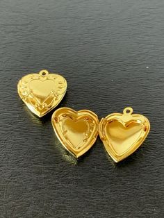 "2 gold tone or silver tone heart shaped locket, heart locket, heart locket gold, heart locket silver, locket heart, gold heart locket, small heart locket Scroll design. ★ Pendant Size: 7/8\" L X 3/4\" W. ★ More pendants, charms, beads, jewelry making supplies and buttons available at https://www.etsy.com/shop/ElevenWestDesigns" Gold-plated Heart Charm Locket Necklace As A Gift, Gold Heart-cut Locket Necklace For Gift, Heart-shaped Locket Necklace For Keepsakes, Heart Shaped Brass Locket Necklace, Heart-shaped Brass Locket Necklace For Gifts, Gold Heart Locket, Scroll Design, Silver Lockets, Heart Locket