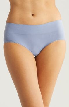 Smooth, stretchy and invisible under outfits, these everyday hipster briefs feature a no-pinch wide waistband and sweet picot trim around the leg openings. Lined waistband Four-way-stretch fabric 91% nylon; 9% spandex Hand wash, line dry Imported Seamless No-show Shapewear Bottoms, Seamless Shaping Brief Bottoms, Shaping Seamless Brief Bottoms, Micro-elastic Briefs With Contoured Waistband, Blue Stretch Smoothing Bottoms, Blue Stretch Bottoms With Smoothing Detail, Supportive Seamless Bottoms For Daywear, Elastic Seamless Shapewear Bottoms, Elastic High-cut Leg Seamless Bottoms