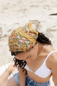 Level up your look with this multicolored, ultra-versatile bandana. Crafted from soft, breathable fabric, this bandana is adorned with whimsical paisley and floral prints. It can be braided into your hair, tied around your neck, or used to accessorize your tote bag—the possibilities are endless! Material: 100% Modal Length: 21" Width: 21" Made In India Summer Festival Paisley Print Bandana, Bohemian Bandana For Spring Vacation, Summer Beach Bandana Bandeau, Summer Beach Bandeau Bandana, Summer Beach Headband, Summer Cotton Bandana With Paisley Print, Spring Beach Bandana Headband, Bohemian Bandeau Bandana For Beach, Summer Bandeau Headband