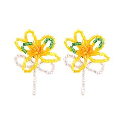 two yellow and green hair clips with bows on each side, one is attached to the other