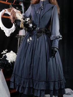 A classical dress that will make you look like a daughter of a prestigious British aristocracy. It has a high neck design, and is decorated with ruffles from the shoulders to the chest and waist, and a ribbon can be tied at the back. An elegant item reminiscent of the good old days. 
 
 
 Color 
 
 Dark gray 
 Pink gray 
 
 
 Size 
 
 
 
 
 S size 
 
 Length: 121cm 
 Shoulder width: 37cm 
 Bust: 84cm 
 Waist: 64cm 
 Sleeve length: 60cm 
 
 M size 
 
 Length: 123cm 
 Shoulder width: 38.5cm 
 Bust Victorian Long Sleeve Party Dress, Elegant Victorian Dress For Halloween Wedding, Elegant Victorian Dress Fitted With Ruffles, Elegant Fitted Victorian Dress With Ruffles, Elegant Long Sleeve Costume Dress, Victorian Dress For Costume Party, Dark Academia Fitted Ruffle Dress, Dark Academia Fitted Dress With Ruffles, Long Sleeve Victorian Dress For Party