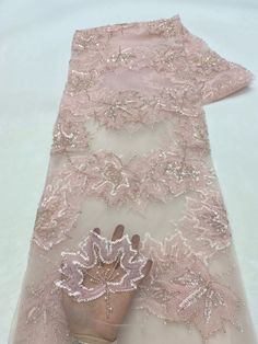 This high quality Fabric is measured in 5 Yards With Embroidered Beading and Sequin. It is soft, very delicate and beautiful. This high Quality Fabric is made with Fashion embroidered rhinestones can be used in making party wedding dresses, skirts, shawls, scarves and other other fashion apparels as you would like. Size : Length : 5 yards (180 inch). Width: 50 inch (Please allow slight deviation for the measurement data ,±1 inch) Material: 100% Polyester, Tulle Lace Fabric, Eco-Friendly embroide Elegant Floral Embroidered Fabric For Banquet, Elegant Pink Sequin Fabric With Floral Embroidery, Elegant Sequin Tulle Fabric With Floral Embroidery, Elegant Floral Embroidered Tulle Fabric For Party, Elegant Organza Embroidered Fabric For Banquets, Elegant Embroidered Organza Fabric For Banquet, Elegant Organza Embroidered Fabric For Banquet, Elegant Fitted Tulle Fabric With Pearl Embroidery, Wedding Lace Tulle Fabric With Rhinestones