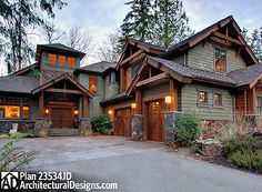 a large house with lots of windows and wood trim