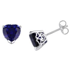 These lovely blue sapphire heart stud earrings are crafted in sterling silver and feature two heart-cut, prong-set created blue sapphires in a simple and sophisticated solitaire stud design. Instantly add a touch of color and elegance to any ensemble with these gorgeous gemstone earrings. A perfect versatile addition to any jewelry collection. Choose these earrings for that special person in your life. The earrings are secured with butterfly back closures. Sapphire Crown, Blue Sapphire Studs, Sapphire Stud Earrings, Sapphire Earrings Studs, White Sapphire Ring, Sapphire Studs, Tassel Drop Earrings, Hoop Earring Sets, Topaz Earrings