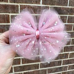 "Outfit your little one in a one-of-a-kind! A handmade Solid Sparkle Tulle Bow or Piggies Set adds a bit of sparkle to any outfit. With glitter pieces in cool colors, they'll be the most stylish toddler on the block! Get ready for the oohs and awws! * 5\" width single bow * 3\" width piggies set * 3\" width mini single bow ** Barrette style clip on 5\" bows. Alligator style clip on all 3\" bows." Tulle Hair Bow, Tulle Hair Bows, Strawberry Outfit, Flower Girl Outfits, Bow Light, Tulle Bow, Bow Barrette, Light Mauve, Tulle Bows