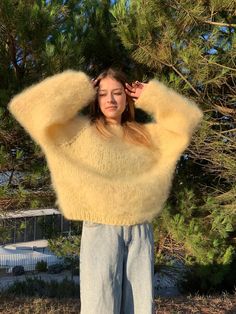 Add a touch of warmth and luxury to your wardrobe with this hand-knitted oversized sweater, crafted with love and care. Made from premium quality, soft mohair-blend yarn, this light-yellow, fluffy sweater will keep you warm and stylish throughout the cooler months. ✨ Features: Hand-knitted with high-quality mohair-blend yarn Oversized, slouchy fit for a relaxed and cozy look Soft, lightweight, and ultra-fluffy texture Long, wide sleeves for added comfort and style Perfect for layering or wearing Wide Sleeve Sweater, Yellow Knit Sweater, Pull Oversize, Fluffy Sweater, Mohair Yarn, Yellow Knit, Oversized Knitted Sweaters, Oversized Pullover, Mohair Sweater