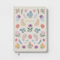 a notebook with colorful flowers on it