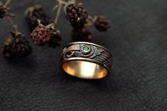 It is a perfect gift for you and your loved ones since it is a handmade brass ring with natural Tourmaline Gemstones. The ring is fully handmade and processed by traditional methods, with little patina. It has Odin's Ravens Hugin & Munin on it. WE OFFER 100% NATURAL GEMSTONES CARVED FROM RAW STONES WHICH MAKES OUR PRODUCTS OF THE BEST QUALITY. We are small family jewelers located in Latvia, Europe, and we are proud that in our products, we use only genuine, natural, and unique materials. We spen Unique Engraved Brass Rings, Engraved Brass Rings, Round Brass Birthstone Jewelry, Symbolic Brass Jewelry For Promise, Handmade Bronze Rings For Collectors, Heirloom Brass Jewelry For Anniversary, Distinctive Brass Jewelry For Anniversary, Unique Brass Jewelry For Anniversary, Vintage Hand Forged Jewelry For Anniversary