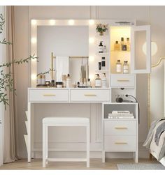 a white dressing table with lights on it