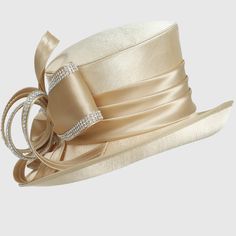 Featuring a striking satin bow and a unique asymmetrical brim, our exquisite church hat is crafted to make a statement during worship. Made from premium satin and adorned with an elegant rhinestone chain accent, it adds sophistication to your attire. Asymmetric Brim. One size fits most. Adjustable the size by innner Velcro. Handmade. Ship it in heavy box. Church Dresses For Women, Women Church, Church Hat, Church Dress, Elegant Hats, Rhinestone Chain, Church Dresses, Church Hats, Dress Hats