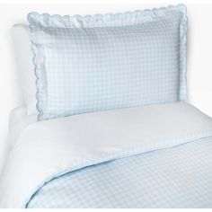 a blue and white checkered comforter set with two pillows on the bottom half