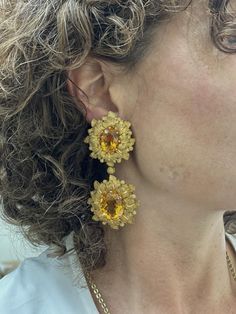 Pair of impressive Buccellati leaf motif earrings, with citrine gemstones, in 18k gold. DESIGNER: Buccellati MATERIAL: 18k Gold GEMSTONES: Citrine DIMENSIONS: Earrings are 80mm long x 37mm at widest point. MARKED/TESTED: Buccellati, Italy, 750, 01063. WEIGHT: 62.9 grams. CONDITION: Previously Owned, Excellent Condition. Luxury Yellow Gemstone Earrings, Luxury Yellow Gold Citrine Earrings, Formal Yellow Earrings With 17 Jewels, Yellow Earrings With 17 Jewels For Formal Occasions, Elegant Formal Citrine Earrings, Opulent Gold Earrings For Formal Occasions, Elegant Yellow Clip-on Jewelry, Formal Yellow Clip-on Earrings, Luxury Citrine Jewelry With Matching Earrings