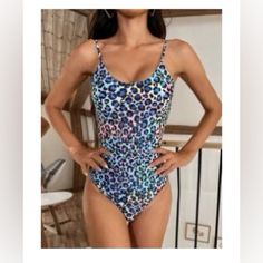 Shein All Over Leopard Print Backless One-Piece Swimsuit. Size Medium In Women’s. Never Worn But Has Been Washed Once. It’s In Great Condition. It’s Backless With Spaghetti Straps That Can Be Adjusted The Padding For The Top Inserts Do Not Come With It. 82% Polyester And 18% Spandex. Trendy Sleeveless Pool Bodysuit, Casual One-piece With Lined Body For Pool, Casual Lined One-piece For Pool, Trendy One-piece Bodysuit For Poolside, Trendy Stretch Bodysuit For Beach Party, Trendy Stretch Bodysuit For Pool, Trendy Sleeveless One Piece For Swimming, Sleeveless Bodysuit For Beach Party, Trendy Stretch Bodysuit For The Pool