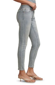 A low-rise waist adds retro-cool vibes to these sleek skinny jeans enhanced with easy stretch. Zip fly with button closure Five-pocket style 91% cotton, 7% polyester, 2% elastane Machine wash, tumble dry Imported Chic Straight Leg Jeggings, Chic Everyday Straight Leg Jeggings, Chic Straight Leg Jeggings For Everyday, Everyday Mid-rise Jeans, Fitted Washed Jeans With Standard Cut Leg, Trendy Washed Mid-rise Jeans, Stretch Mid-rise Washed Bottoms, Trendy Mid-rise Washed Jeans, Fitted Slim Cotton Bottoms