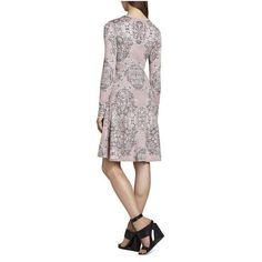 Twirl stylishly from one sunny-season fete to the other in this inspired dress with artful jacquard floral patterns. Round neck.Long sleeves. Allover jacquard floral pattern.Seamed waistline.PleatedA-line skirt.70% silk, 30% rayonDry Clean. Elegant Fitted A-line Floral Dress, Fitted A-line Elegant Floral Dress, Elegant Jacquard Midi Dress For Spring, Elegant Spring Jacquard Midi Dress, Elegant Paisley Print Dress, Elegant V-neck Patterned Midi Dress, Elegant Floral Print Fit And Flare Midi Dress, Elegant Patterned V-neck Midi Dress, Elegant Jacquard Knit Midi Dress