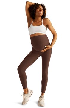 Keep up your yoga practice throughout your pregnancy in stretchy maternity leggings ingeniously designed with a wide, flatlock-seamed Empire waistband. 24 1/2" inseam; 7" leg opening; 14 1/2" front rise; 17" back rise (size Medium) Lined gusset 87% polyester, 13% elastane Machine wash, tumble dry Made in the USA of imported fabric Brown Fitted Activewear For Yoga, Brown Athleisure Leggings For Yoga, Full Length Brown Yoga Activewear, Full Length Brown Activewear For Yoga, Full-length Brown Activewear For Yoga, Fitted Brown Activewear For Pilates, Brown Fitted Activewear For Pilates, Brown Full-length Activewear For Yoga, Brown Stretch Leggings For Yoga