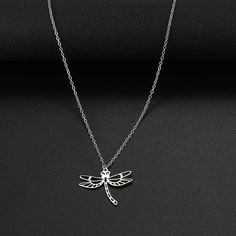 Add some whimsical charm to your style with our Stainless Steel Dragonfly Necklaces. The delicate and intricate design of the dragonfly creates a playful and elegant look, perfect for any nature lover or free spirit. Elegant Adjustable Dragonfly Necklace, Adjustable Dragonfly Necklace For Gifting, Nickel Free Adjustable Dragonfly Necklace, Adjustable Dragonfly Necklace For Gift, Dragonfly Necklaces, Necklaces Butterfly, Butterfly Animal, Chain Collar, Dragonfly Necklace