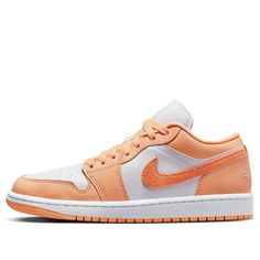 The Air Jordan 1 Low 'Sunset Haze' is a stylish silhouette that features a bright orange and white colorway. Crafted with leather and suede Swooshes, mesh tongues and linings, the sneaker is completed with a two-tone rubber sole. Perfect for any activity, this sneaker draws inspiration from the hazy sunset, making it a must-have for any sneaker enthusiast. With its unique design, the Air Jordan 1 Low 'Sunset Haze' is sure to be a hit. (AJ1/SNKR/Retro/Low Top/Women's/Classic/Non-Slip/Basketball/Wear-resistant) Orange Sporty Sneakers For Spring, Sporty Orange Sneakers For Spring, Modern Orange Sneakers With Boost Midsole, Orange Cushioned Sneakers For Spring, Spring Orange Cushioned Sneakers, Modern Orange Sneakers With Contrast Sole, Peach Low-top Sports Sneakers, Orange Leather Sneakers With Cushioned Footbed, Peach Round Toe Sneakers For Streetwear