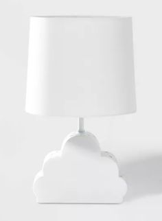 a white lamp with a cloud on it