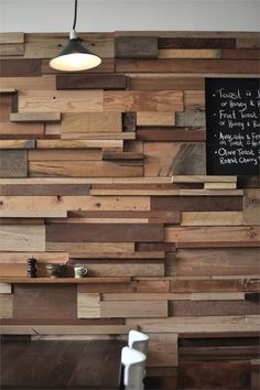 a kitchen with wooden walls and white appliances