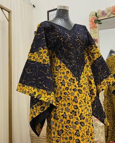 Made for classic and modest woman Beautiful print and perfectly sewn. Boubou Styles For Women, Kaftan Styles, Bubu Gown Styles, Ankara Dress Designs, African Fabric Dress, Long African Dresses, African Print Dress Ankara, African Wear Dresses, African Inspired Clothing