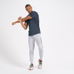 Restocking Mid-March. A fresh take on athleisure and a staple in your wardrobe, the Sunday Performance Joggers are premier in fit, function and soft stretch. The shorter inseam will keep you moving with less bulk around your ankles; these joggers offer equal parts of style and comfort. | Sunday Performance Jogger Pants | Platinum Heather Vuori makes premium performance apparel inspired by the active Coastal California lifestyle; an integration of fitness, surf, sport, and art. Breaking down the Casual Activewear For Running With Ribbed Waistband, Casual Activewear With Ribbed Waistband For Running, Versatile Workout Joggers With Tapered Leg, Sportswear 4-way Stretch Joggers With Side Pockets, Sporty 4-way Stretch Sweatpants With Side Pockets, Sportswear Athletic Fit Sweatpants For Running, Athleisure Activewear With Side Pockets In Recycled Polyester, Athletic Fit Sweatpants For Running, Casual Athletic Fit Running Pants