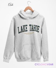 Lake Tahoe Vintage Style College Hoodie Sweatshirt Perfect for any situation, these heavy blend hooded sweatshirts are pure comfort. Made from a polyester and cotton combination which helps designs come out looking fresh and beautiful. The collar is ribbed knit, so it retains its shape even after washing. There are no itchy side seams on these sweaters. SIZING: Sweatshirts are unisex regular fit. Pick your usual size for a normal fit or size up for a more relaxed feel. Please check size chart fo Style College, Nevada Travel, Lake Tahoe California, Ski Vacation, College Sweatshirt, Cozy Hoodie, Style Hoodie, Lake Tahoe, Quality T Shirts