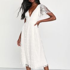 Your Style Will Always Win You A Spot On The Best Dressed List When You Wear The Lulus Elegant Approach White Embroidered Flutter Sleeve Midi Dress! Airy Woven Tulle, Decorated With Intricate Embroidery Throughout, Shapes Short Flutter Sleeves That Frame A Sultry Bodice With A V-Neckline And Matching V-Back. Set-In Waist Boasts Subtle Lace Trim, Atop A Flaring Skirt That Falls To A Midi Hem. Hidden Zipper/Clasp At Back. Lined. Shell: 100% Polyester. Lining: 100% Polyester. Exclusive Of Decoratio Scalloped Lace V-neck Dress For Brunch, White Butterfly Sleeve Dress For Garden Party, White Dress With Butterfly Sleeves For Garden Party, V-neck Scalloped Lace Dress For Brunch, V-neck Scalloped Lace Dress For Garden Party, White Flowy Dress With Butterfly Sleeves, Spring V-neck Midi Dress With Scalloped Lace, V-neck Dress With Lace Sleeves For Brunch, V-neck Dresses With Lace Sleeves For Brunch