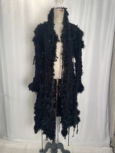 Very cool boho  Hand knit Chenille and Feather jacket coat small /med Fringe Long Sleeve Outerwear For Winter, Winter Long Sleeve Outerwear With Feather Trim, One-size Long Sleeve Outerwear For Festivals, Long Fringed Outerwear For Winter, Long Fringe Outerwear For Winter, Long Winter Outerwear With Fringe, Knit Outerwear For Fall, Knit Outerwear For Cold Weather In Fall, Fringe Outerwear For Fall Festival