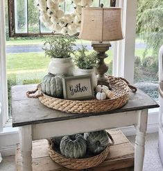 a table with some pumpkins on top of it