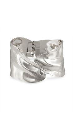 Elevate your nightout look with the Melted Abstract Rhodium Plated Cuff Bracelet from Ettika. Crafted with a sophisticated metallic finish and a plain pattern, this statement piece is perfect for adding a touch of elegance to any evening ensemble. Embrace effortless style and make a bold impression.18k gold platedsteel2.4" x 1.9" diameter Ettika Womens Melted Abstract Rhodium Plated Cuff Bracelet - White/silver Trendy Nickel-free Metal Cuff Bracelet, Luxury Statement Silver Cuff Bracelet, Elegant Nickel-free Metal Cuff Bracelet, Silver Stainless Steel Cuff Bracelet, Tarnish Resistant, Modernist Silver Metal Cuff Bracelet, Silver Cuff Bracelet, Women Accessories Jewelry, White Silver, Pacsun