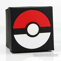 a black box with a red and white pokeball on it