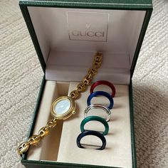 Gucci Bezel Watch. Comes With Original Paperwork And Box. Multiple Bezels A Couple Of Repeat Color, 2 Silver For Example. 17 Plastic Bezel 15 Metal New Battery This Is Used And Vintage. A Scratch On The Face That I Did Try To Demonstrate On The Photo See Last Couple. Not Noticeable Unless Light Hits It Directly Does Not Obscure The Time Extra Links To Make It Larger. I Have Owned This The Entire Time And Have Not Worn For Years Please Reach Out With Any Questions Gucci Vintage Watch, Gucci Bezel Watch, Vintage Gucci Watch, Bezel Watch, Gucci Watch, Watch Vintage, Gucci Accessories, Color 2, Vintage Watches