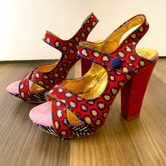 Irregular Choice Mutiny Mustard Dot Platform Heels, Size 38. Super Unique And Fun! Tried On But Never Worn. So Beautiful I Had Them On Display In My Home! Crossover Toe, Lilac Suede Toe Pad, & Red Glossy Cork Heels. Easy Velcro Closure For Adjustable Fit. Comes From A Smoke Free Home. No Original Box But I’ll Toss In A Cool Foil Irregular Choice Tote As A Bonus Gift! Red Heels With Wooden Heel For Party, Party Red Heels With Wooden Heel, Red Party Heels With Wooden Heel, Red Heels With Wooden Heel For Summer, Multicolor High Heel Fabric Sandals, Red Open Toe Heels With Wooden Heel, Red Fabric Heels With Round Toe, Red Fabric Party Heels, Red Block Heels With Wooden Heel