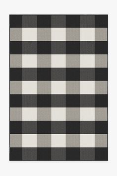 a black and white checkered area rug