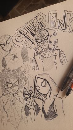 a pen and some drawings on top of a piece of paper with the words spider - man