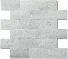 a white brick wall that is made out of cement