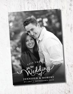 a black and white photo with the words save the date on it is shown in front of a wooden background