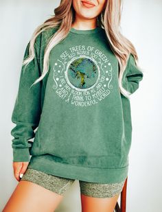 "I See Trees Of Green, Red Roses Too, Wonderful World, Tree Of Life, World Sweatshirt, Tree Sweatshirt, Comfort Colors®, Gift for Hippie Hi! WELCOME TO DELUXSTOREUSA This sweatshirt perfect gift as a holiday apparel. Ideal for any situation, a unisex heavy blend crewneck sweatshirt is pure comfort  Washing Care Instructors Use cold water when washing, do not use bleach, do not dry clean, and do not use an iron directly on the design.  Production Time Production time is 1-2 days. Delivery time varies depending on your delivery address. How to Order?   Please, choose your favorite color and size from the pop-up window.  Select the quantity that you want.  Click \"ADD TO CART\".  You can go back to add more product color for your loved ones members.  You can complete the checkout process.  Pl Butterfly Sweatshirt, Cottagecore Sweater, Cottagecore Shirt, Retro Sweatshirts, Comfort Colors Sweatshirt, Plant A Tree, Tree Shirt, Comfort Colors Tee, Branded Sweatshirts