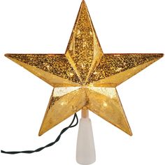 a gold star shaped christmas ornament on a white stand