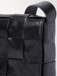 Bottega Veneta's mini bag is just as recognisable as the popular 'Cassette' style thanks to the large intrecciato weave. It's compact but roomy enough to hold the essentials and finished with a signature triangular buckle. Bottega Veneta Mini Bag, Messenger Bag For Men, Bottega Veneta Cassette, Leather Messenger Bag Men, Mini Messenger Bag, New Bottega, Latest Bags, Messenger Bag Men, Crossbody Messenger Bag