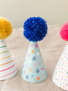 "POM PARTY HATS! We're seeing with rainbow colored glasses! So many styles of rainbow we can hardly contain our excitement. A Rainbow party theme is always a good theme. Hats are made of premium paper with a printed pattern, Poms are handmade. Hat measures 2.5\" across and 3.5\" tall. Hats look good on babies, adults even pets! Hats come assembled with a white elastic band - you can remove it if you wish to use a bobby pin or something else to hold it in place. LISTING IS FOR 1 POM HAT Need some Playful Summer Party Supplies, Novelty Multicolor Party Supplies, Multicolor Novelty Party Supplies, Fun Carnival Party Supplies, Multicolor Playful Costume Hats And Headpieces For Party, Multicolor Playful Costume Hats For Party, Playful Multicolor Costume Hats And Headpieces For Party, Fun Multicolor Party Supplies, Fun Mini Hats For Birthday Carnival